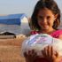 İHH, Afrin'de 20 bin kişilik iftar yemeği dağıttı İHH, Afrin'de 20 bin kişilik iftar yemeği dağıttı