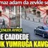 ﻿İki dede cadde ortasında yumruk yumruğa kavga etti! Utanmaz adam da zevkle izledi