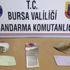 Bursa'da içine eroin yerleştirilen kartpostallar ele geçirildi