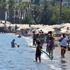 Marmaris te tatilciler plajları doldurdu Marmaris te tatilciler plajları doldurdu