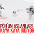 PÖH'ler karla kaplı dağları kayarak geçiyor