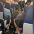 Uçakta koronavirüsten ölen yolcunun görüntüleri ortaya ...