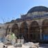 Kilis'te tarihi camiden roket mermisinin izleri siliniyor