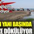 ﻿Plajın yanı başında denize dökülüyor