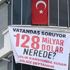 MHP'nin eski belediye başkan adayının evinin balkonuna astığı '128 milyar dolar' pankartı indirildi