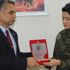 Tuğba Ekinci'ye Şehit ailelerinden plaket