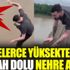 ﻿Metrelerce yüksekten timsah dolu nehre atladı