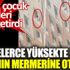 ﻿Küçük çocuk yürekleri ağza getirdi. Metrelerce yüksekte camın mermerine oturdu