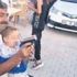 Aksaray'da skandal olay! Kucağındaki torununun eline silah vererek ateş ettirdi