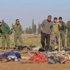 YPG'liler öldürdükleri IŞİD'lilerin cesedini sergiledi